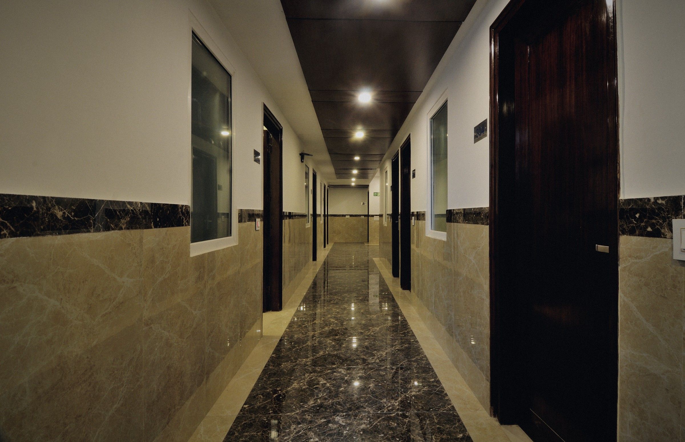 Marble corridor on a guest floor at The Yuvraj