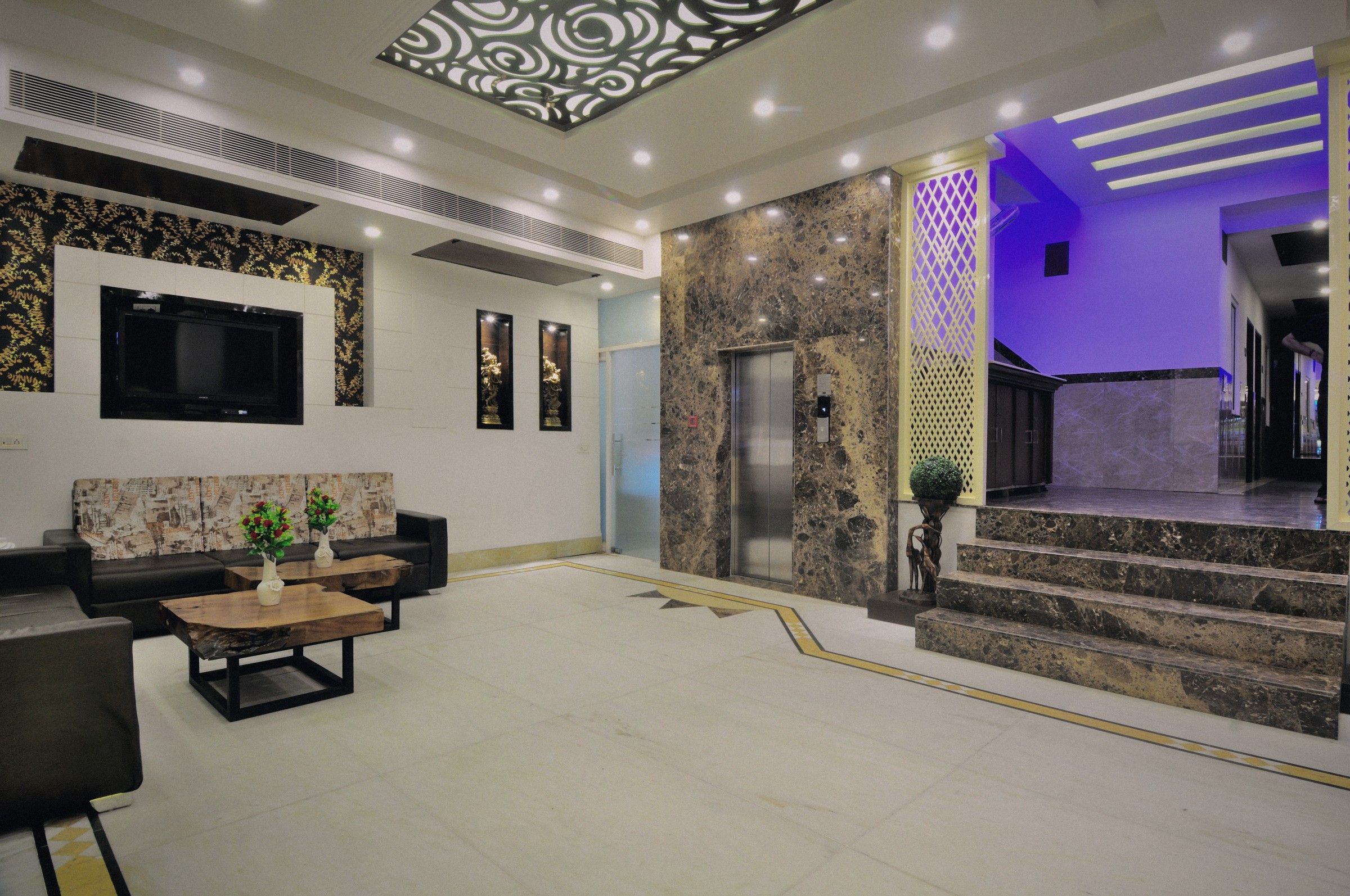 Lobby lounge and lift under violet light
